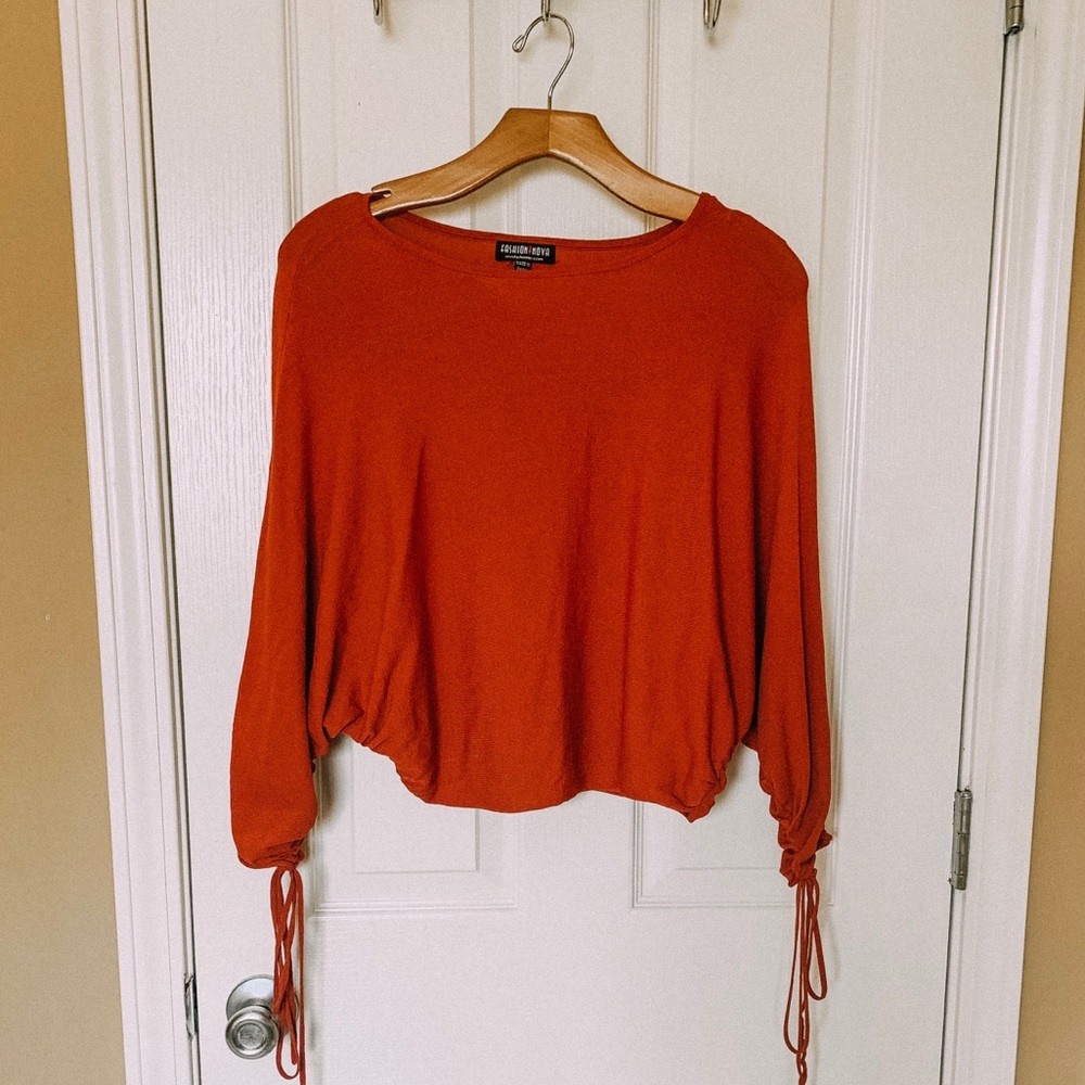 Fashion Nova burnt orange top with tassels
